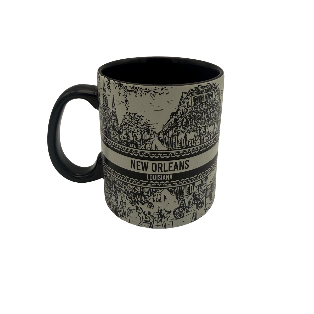 Black-and-white New Orleans souvenir mug with wraparound sketches of French Quarter buildings, carriage, streetcar, and bridge