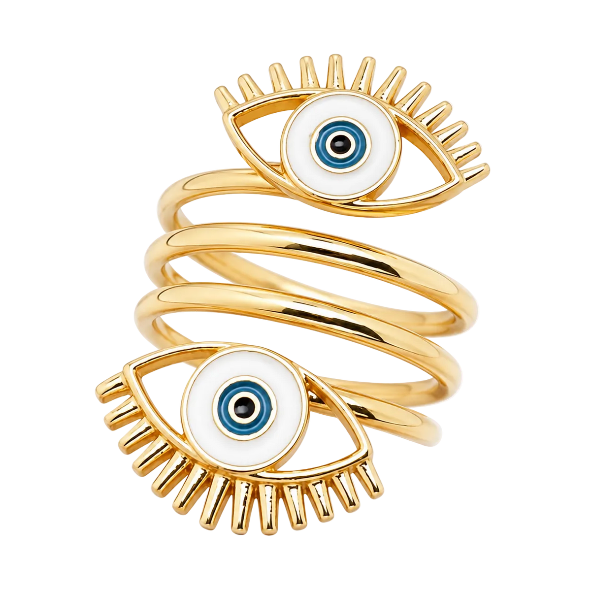 A gold-plated spiral ring featuring two evil eye charms with white enamel, blue and black detailing, and gold eyelashes, set against a plain white background.