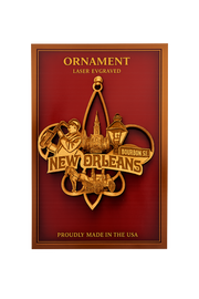Decorative ornament with New Orleans-themed design on a red background
