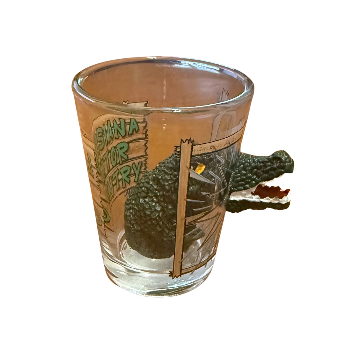 Glass shot glass with a alligator design 