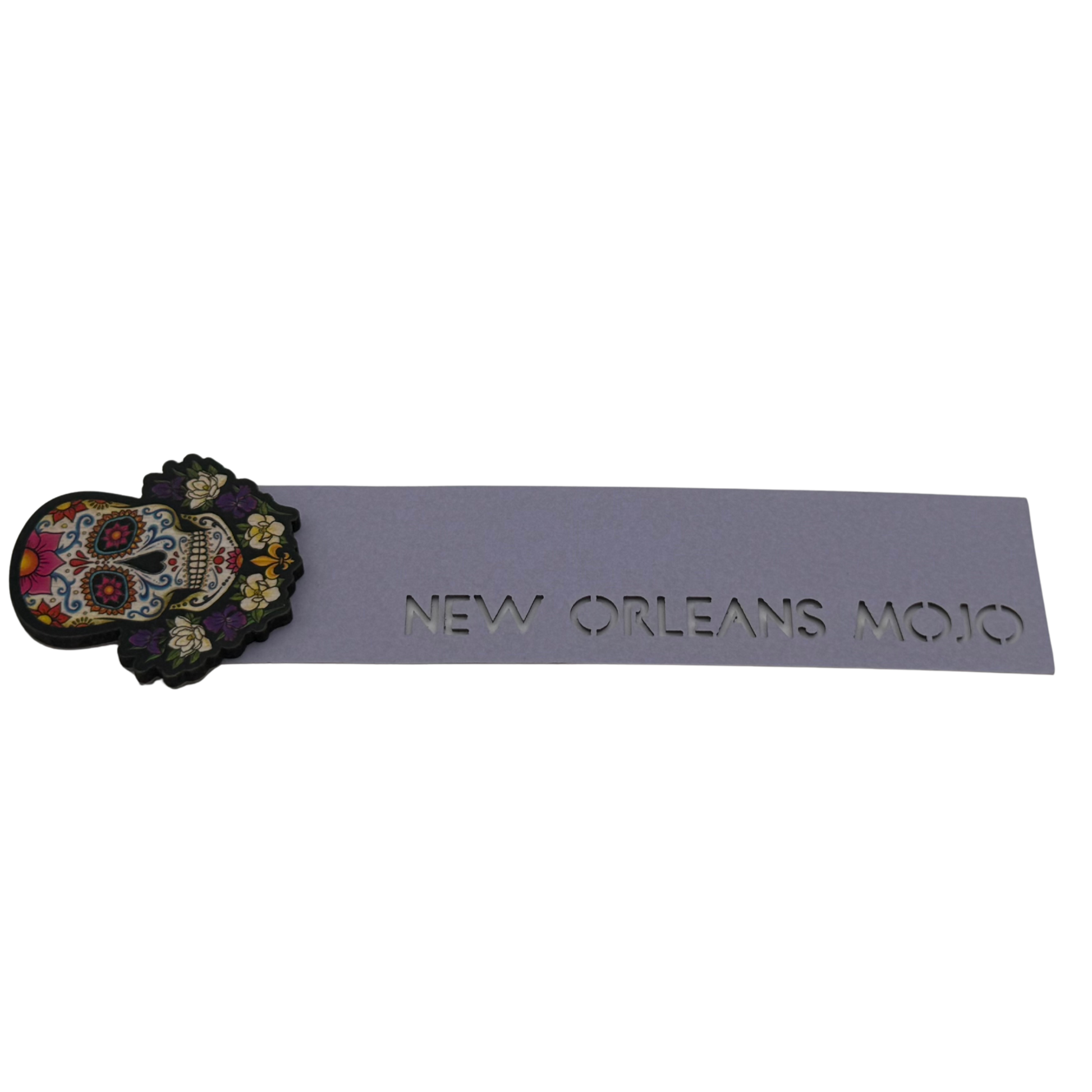 Decorative nameplate with colorful skull design and 'New Orleans Mojo' text on a white background