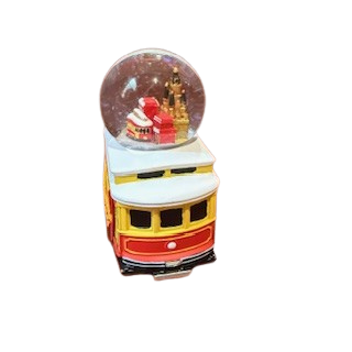 Snow globe with a Christmas scene featuring Santa Claus and a Christmas tree on a white background