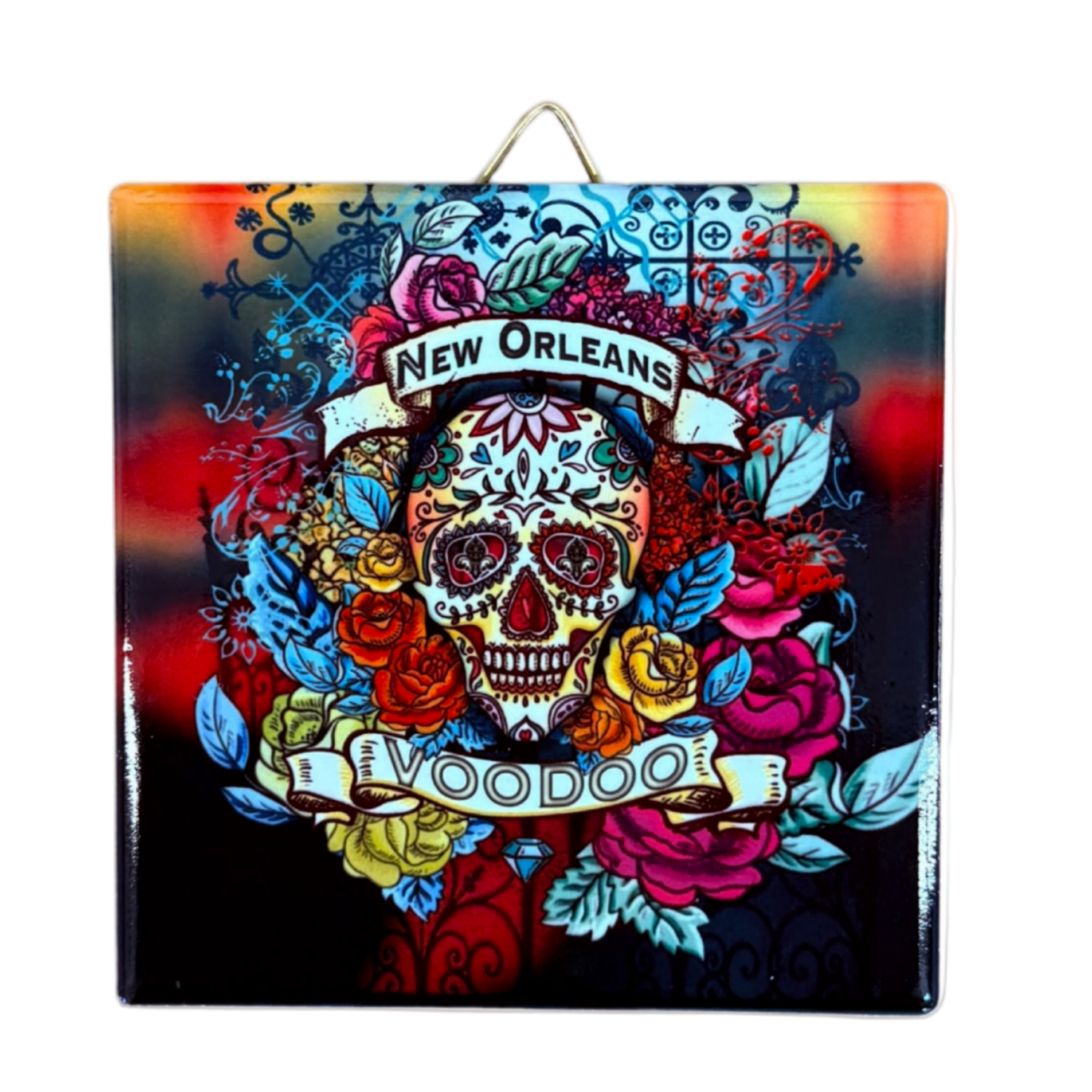 A square decorative ceramic tile featuring a colorful sugar skull illustration with roses and the text 'New Orleans Voodoo' on a black background, shown against a plain white backdrop.