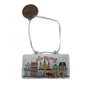 New Orleans architecture ornament with St. Louis Cathedral, colorful historic homes, horse-drawn carriage, and mint ribbon