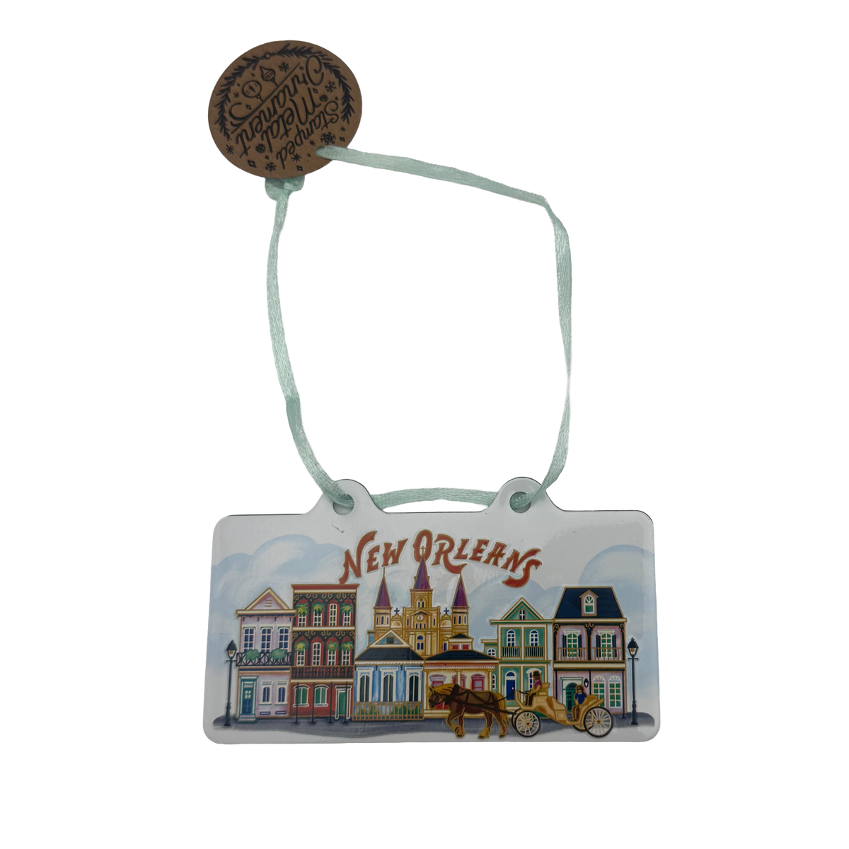 New Orleans architecture ornament with St. Louis Cathedral, colorful historic homes, horse-drawn carriage, and mint ribbon