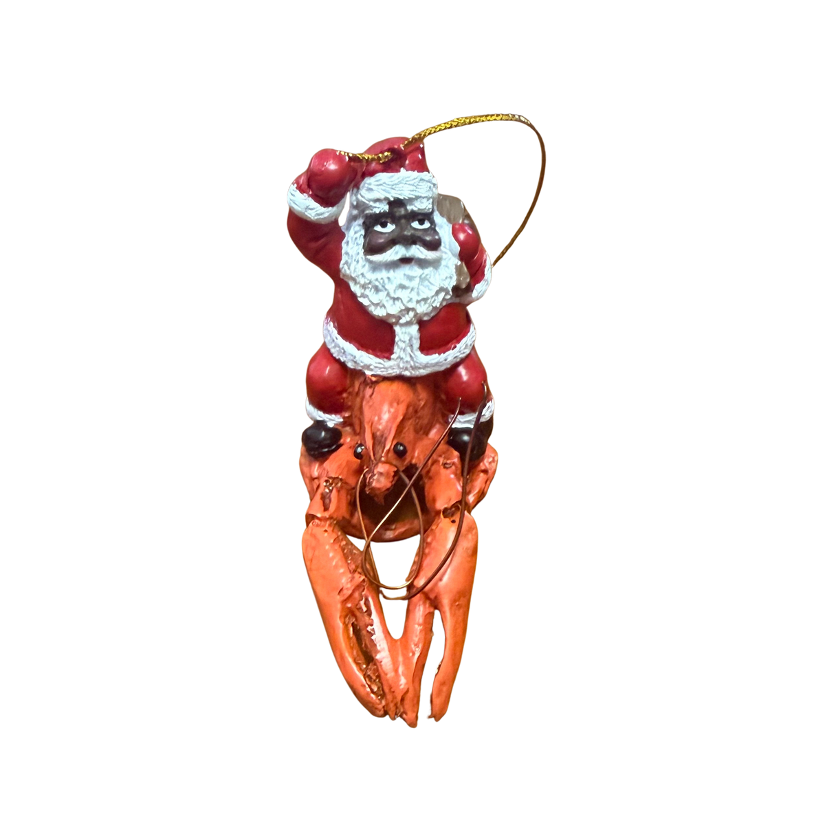Decorative ornament of a lobster wearing a Santa Claus outfit on a white background