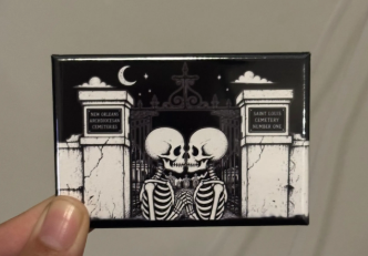 White Gothic Skeletons Against Gate Magnet