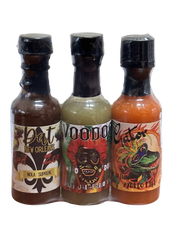Three hot sauce bottles with colorful labels on a white background