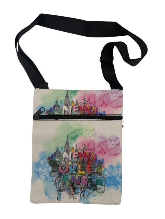 Crossbody bag with colorful 'New World' design on a white background