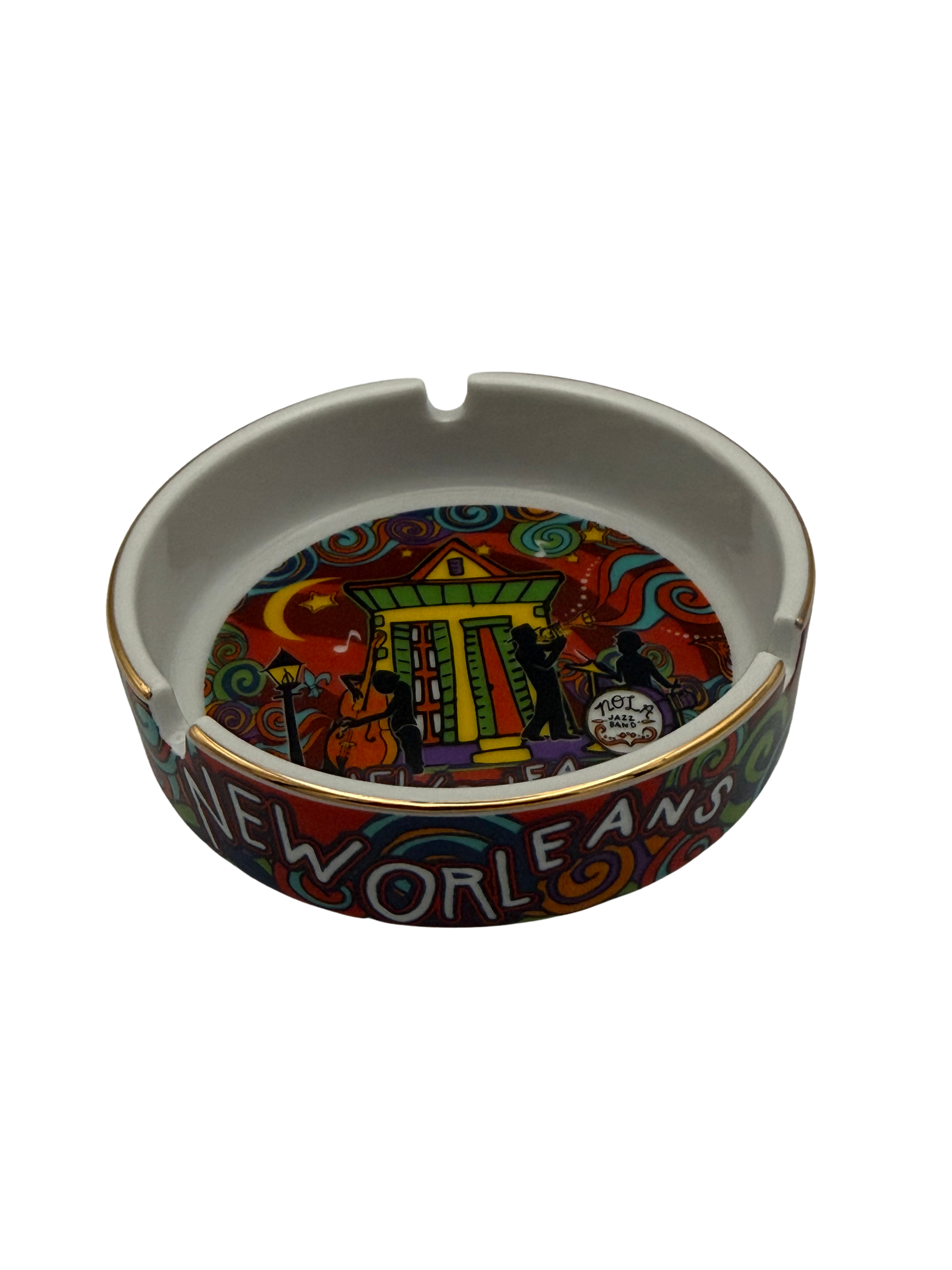 Colorful New Orleans-themed ashtray on a white background